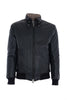 Reversible padded leather jacket with jersey cuffs