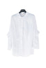 Chemise blanche oversize avec volants sur les manches