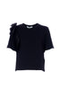 T-shirt nera in cotone con volant