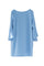 Light blue tunic dress with boat neckline and jewels on the back