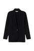 Veste blazer en maille noire avec bouton bijou