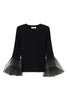 Maglia nera a costine con tulle