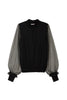 Top nero in maglia e tulle plumetis