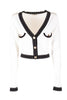 Cardigan cropped bianco e nero con scollo a V