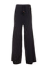 Pantalone flare nero in maglia con bande laterali